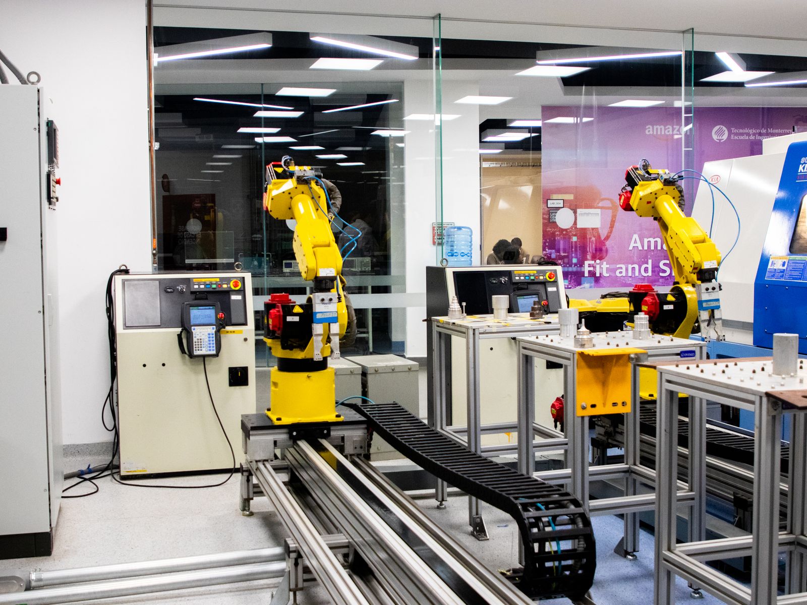 Industrial robotic arms working on an automated manufacturing line